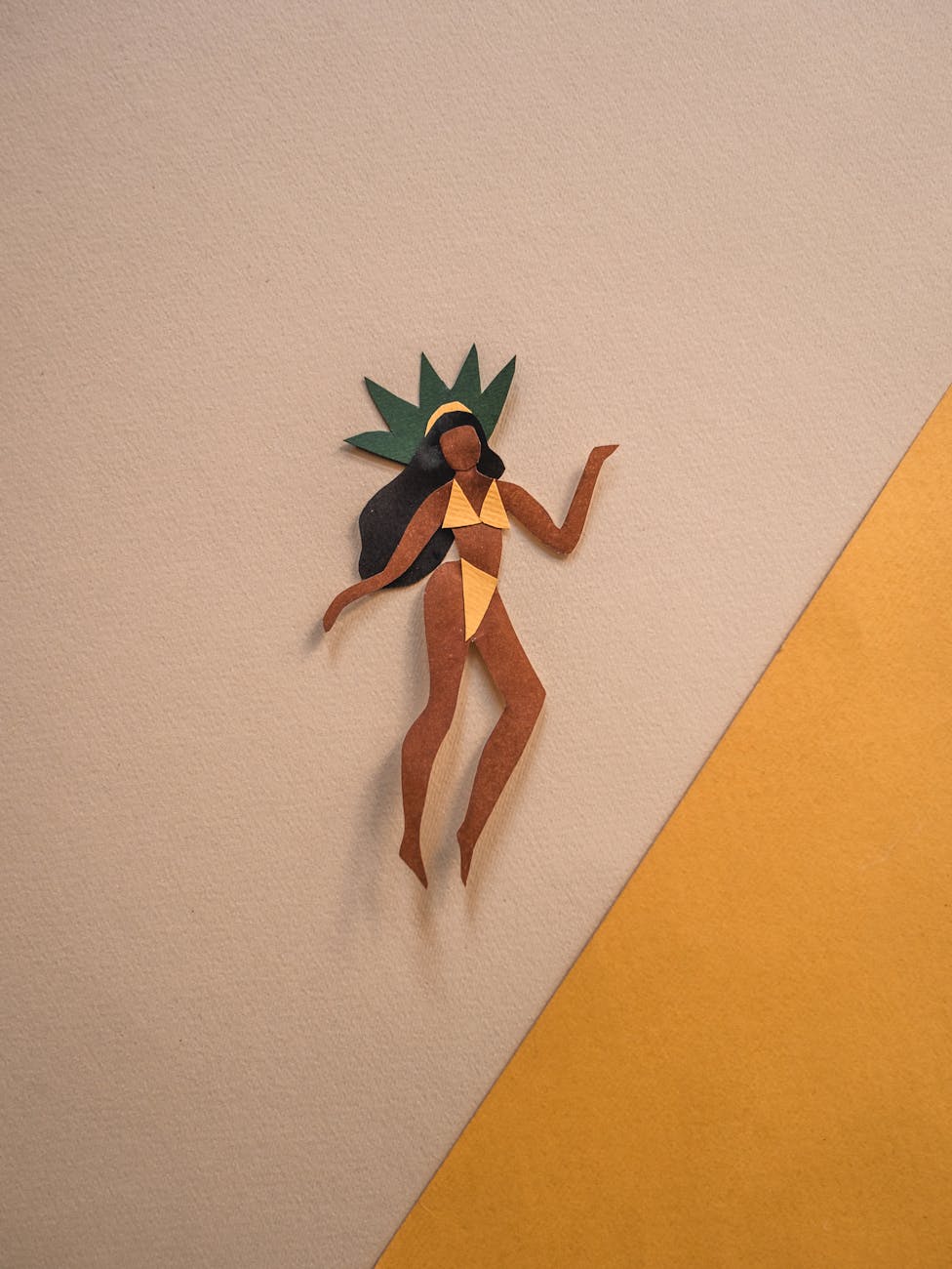 paper cutout of a woman in a bikini
